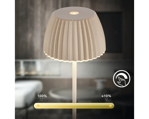 Dimbar bordslampa med plisserad skärm och touchfunktion för ljusstyrkereglering från tio till etthundra procent.
