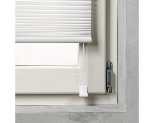 Plisségardin på fönster