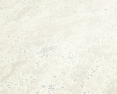 Närbild av ljust färgad tapet med subtil struktur