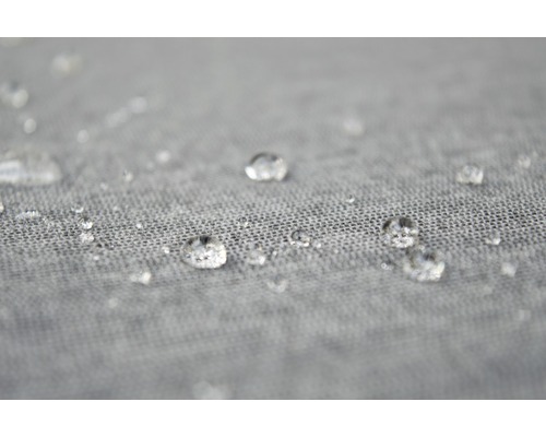 Närbild av vattendroppar på vattenavvisande tyg