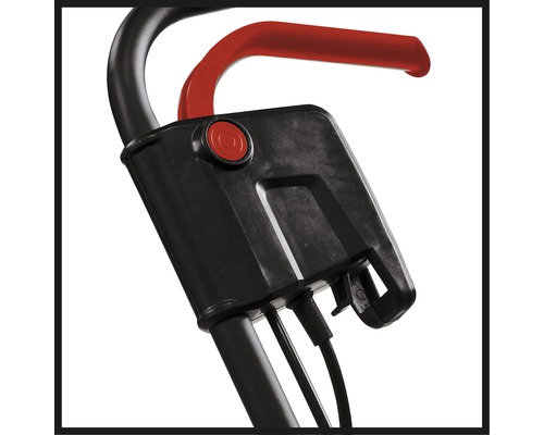 Detalj av ett apparathandtag med kontroller och kablar