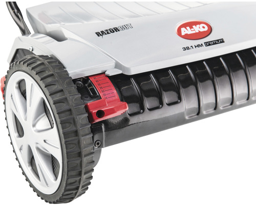 Detaljvy av en handgräsklippare med höjdjustering och AL-KO logotyp.