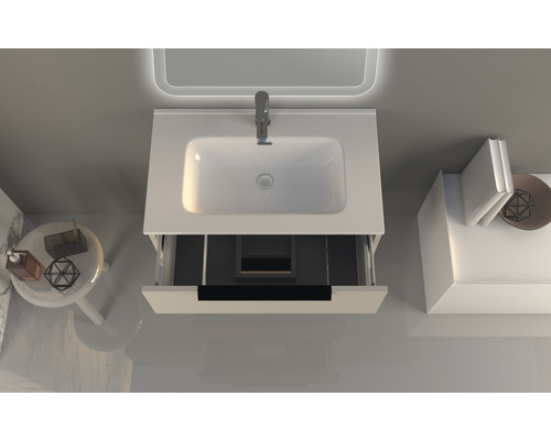 Badrumskommod med öppen låda, handfat och kran ovanifrån