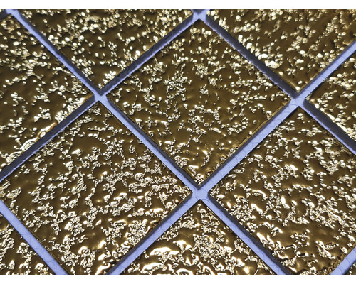 Närbild av mosaikplattor med en ojämn yta