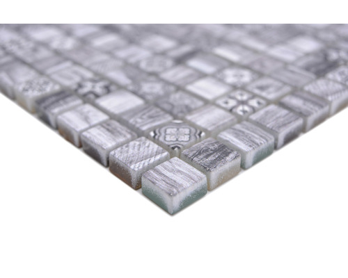 Mosaikplatta av glas och sten