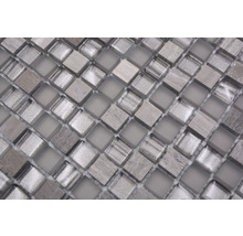 Mosaikplattor av glas och natursten
