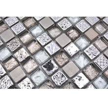Mosaikplattor av glas och sten