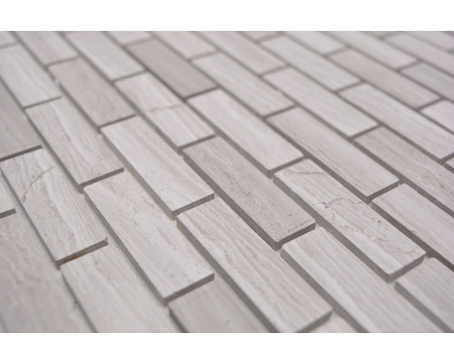 Mosaikplattor av sten i rektangulär form