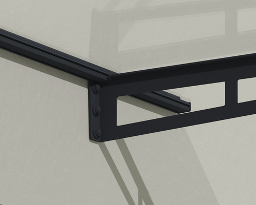 Detaljbild av ett svart takfäste på en vägg