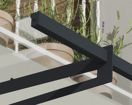 Detaljvy av ett terrasstak med glastak och metallram