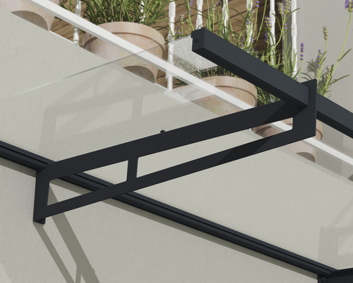 Tak med glasöverdrag och mörk ram för montering på en husvägg