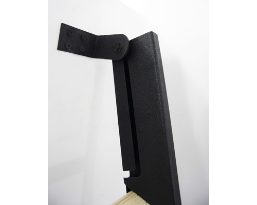 Detaljvy av ett fällbart hyllkonsol för väggmontering.