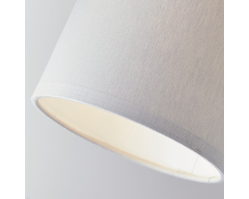 Närbild av en lampskärm i tyg