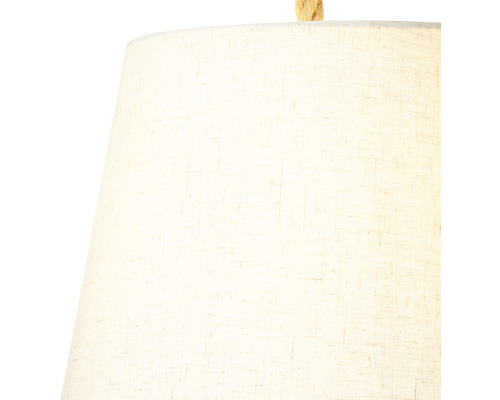 Närbild av en lampskärm med textilyta