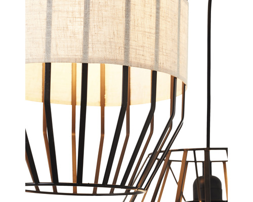 Detaljvy av en hänglampa med tygskärm och metallram