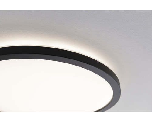 Rund taklampa med svart ram i taket