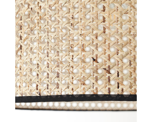 Detaljvy av en lampskärm i rotting