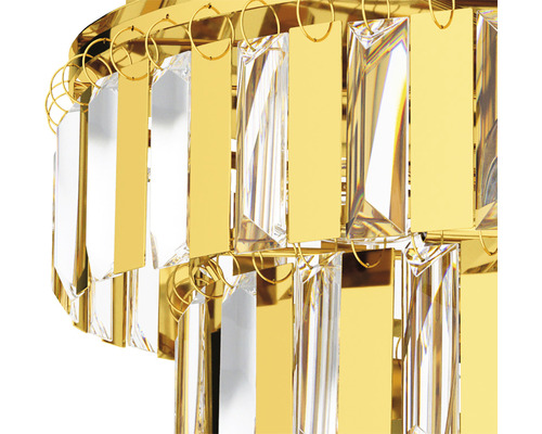 Närbild av en gyllene kristallkrona med rektangulära kristaller