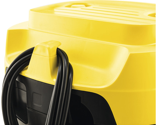 Detaljvy av en dammsugare med kabelupprullning