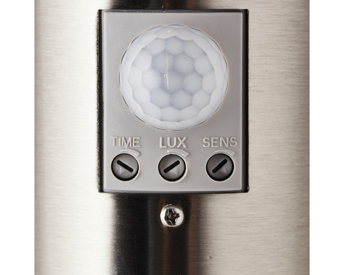 Närbild av en rörelsesensor med inställningar för tid, lux och känslighet