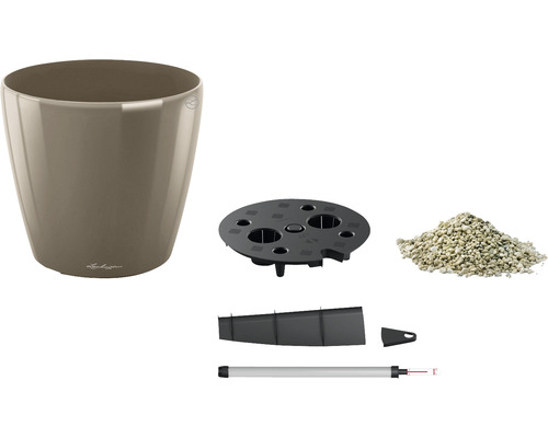 Komponenter i en Lechuza blomkruka med jordsubstrat och bevattningssystem