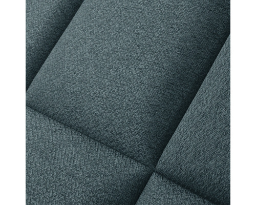 Närbild av klädseln på en stoppad möbel