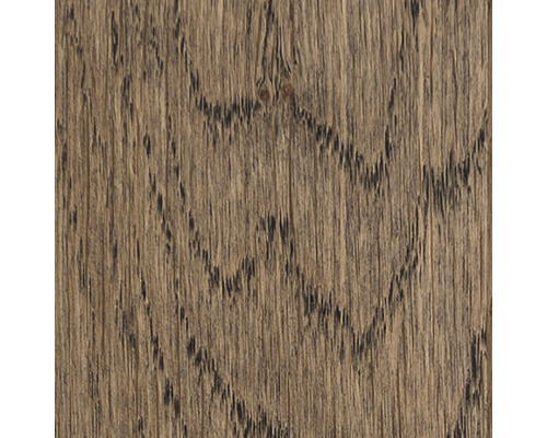 Närbild av en träyta med ådring