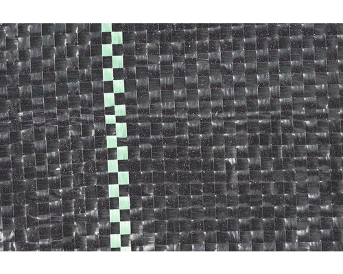 Detaljvy av plastisk ogräsfilm med schackrutigt mönster