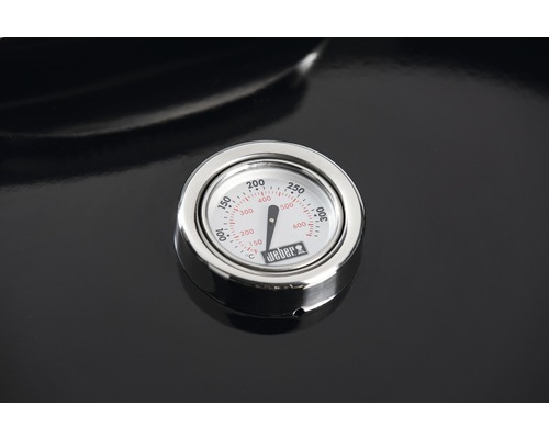 Weber logotyp på en grilltermometer