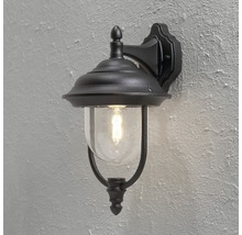 Svart utomhusvägglampa med glaskupol och retroglödlampa.