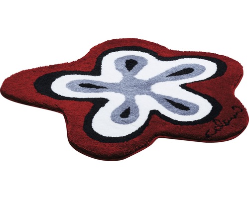 Blommig matta med rött, svart, grått och vitt mönster