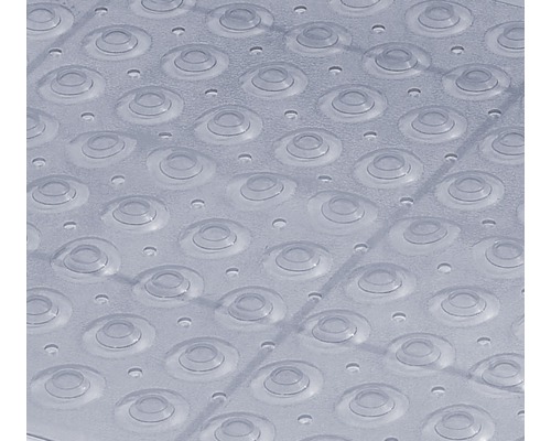 Detaljvy av ett transparent poolskydd med noppor