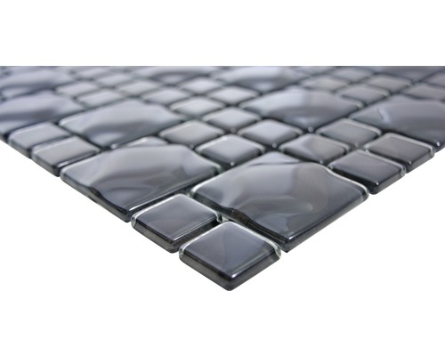 Närbild av en mosaik med kvadratiska och rombformade stenar