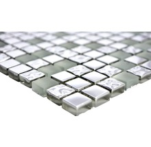 Mosaikplatta av glas och metall
