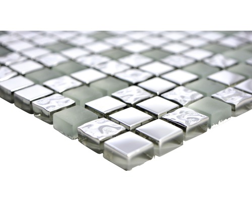 Mosaikplatta av glas och metall