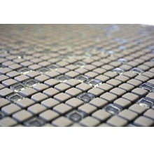 Mosaikplattor av keramik och glas