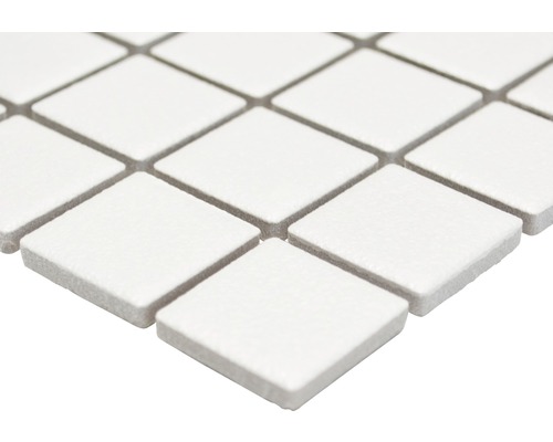 Mosaikplattor i diamantmönster