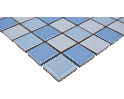 Mönster av mosaikplattor i keramik