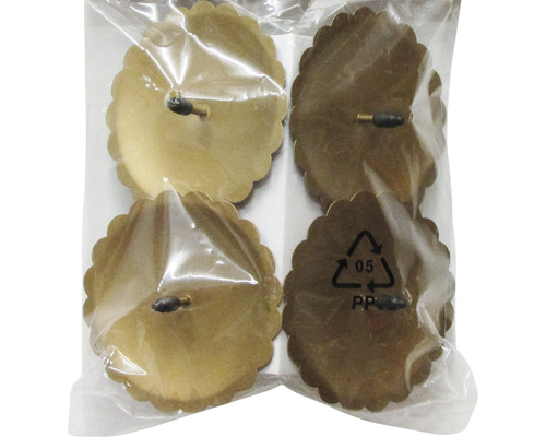 Fyra möbelglidare med blomkant i en förpackning