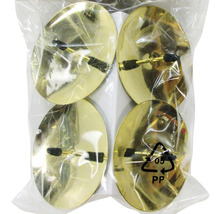 Fyra möbelglid i guldfärg i transparent plastpåse