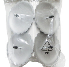 Förpackningsenhet med fyra ljusstakar av metall