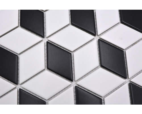 Mosaikplattor med geometriskt kubmönster i svart och vitt