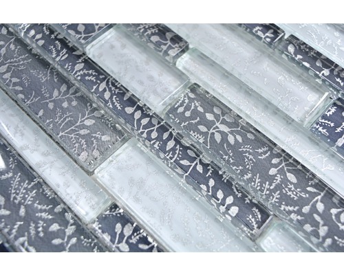 Glasmosaikplattor med växtmönster