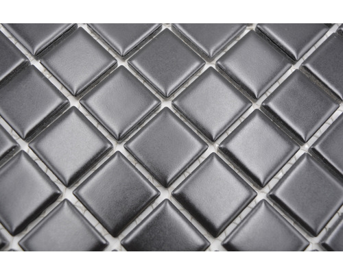 Detaljvy av kvadratiska mosaikplattor