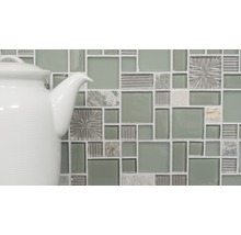 Mosaikplatta av glas och natursten med tekanna