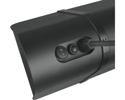 Detaljvy av en svart underskåpslampa med strömbrytare och kabel