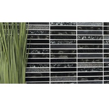 Dekorativ mosaikplatta med avlånga, svarta element