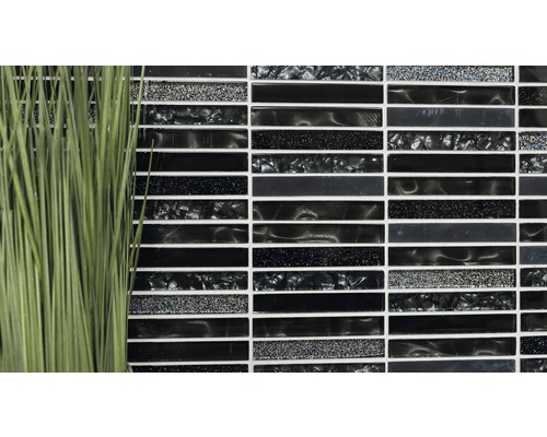 Dekorativ mosaikplatta med avlånga, svarta element