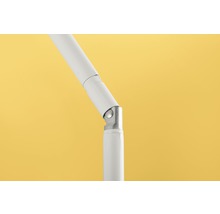 Detaljbild av ett justerbart, vitt lamphållare