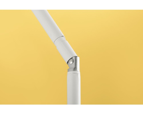 Detaljbild av ett justerbart, vitt lamphållare